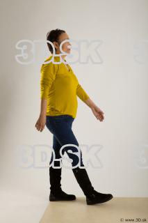 Walking reference of yellow sweater blue jeans Gwendolyn 0006